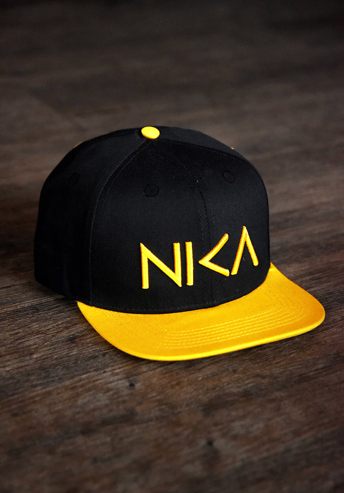 Black & Yellow NIKA Snapback Hat