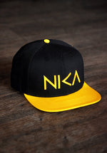 Black & Yellow NIKA Snapback Hat